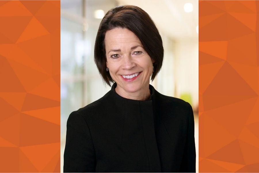 Andrea Nordaune headshot with orange border