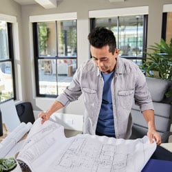 architect looking at drawings