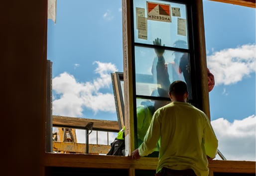 Contractors installing Andersen Windows