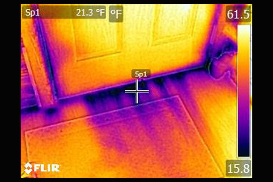 An infrared image that displays air leakage in a home
