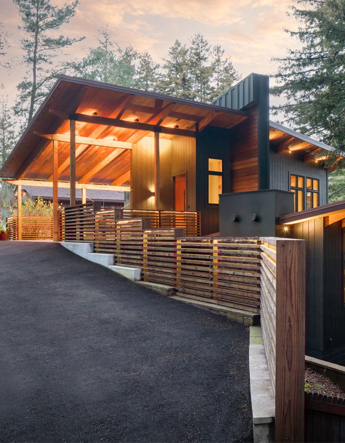 the redesigned home with entrance and carport integrated.
