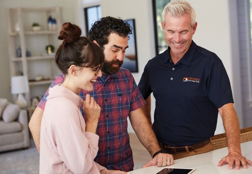 contractor and customer looking at plans for new products