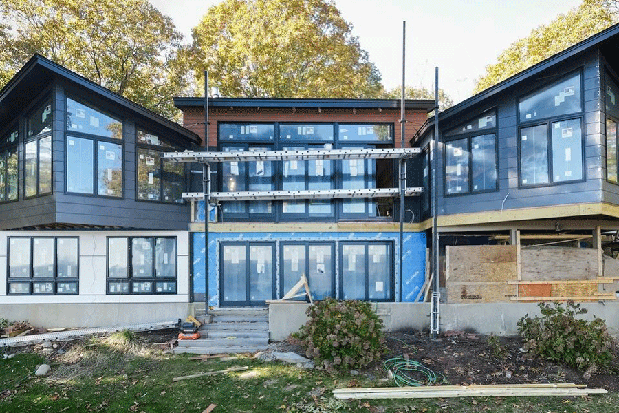 An under-construction home with oceanside views by Sweenor Builders.