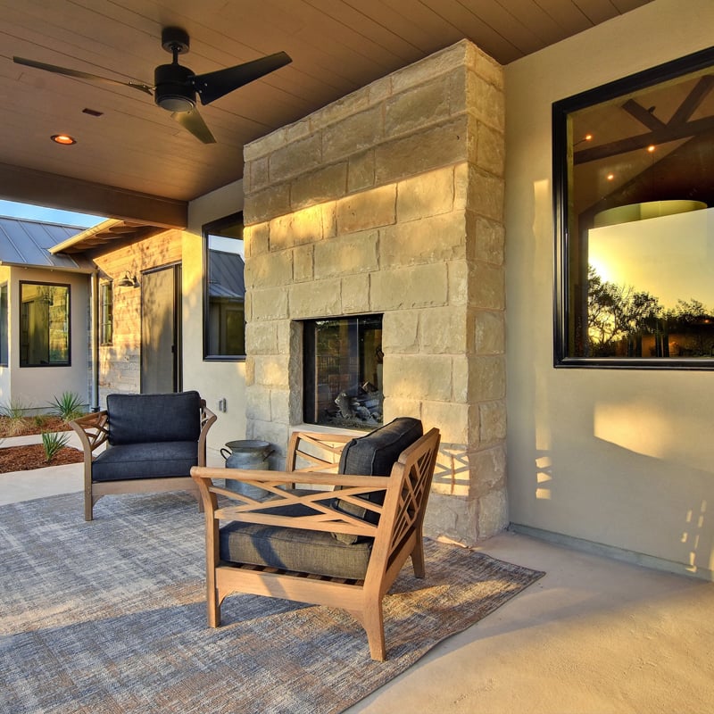Beautiful patio in Texas with fireplace and landscape