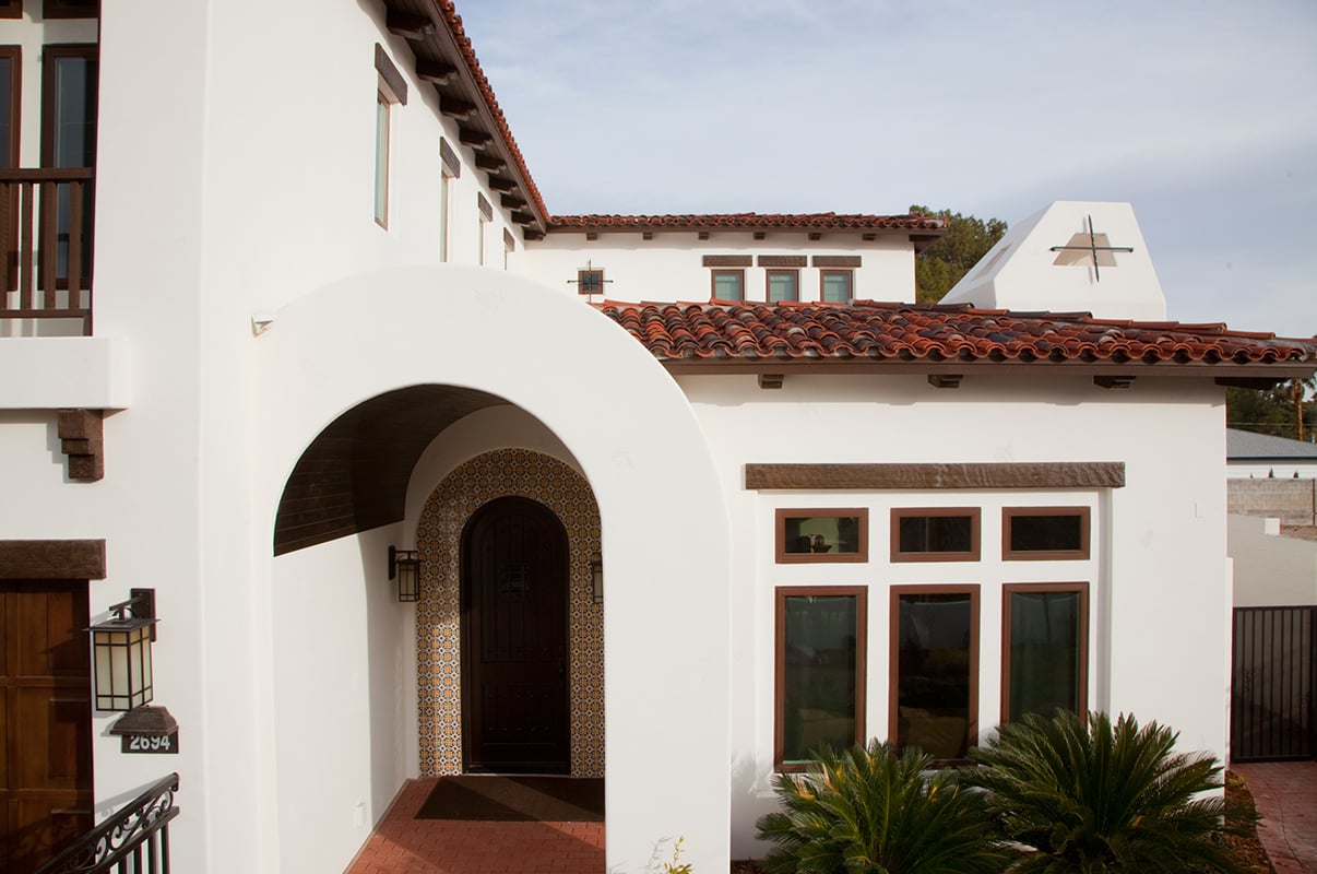 A new construction Spanish-style home with 100 Series windows.