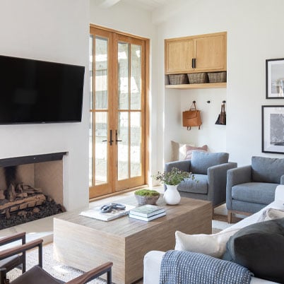 interior of livingroom with white walls and light frames andersen doors