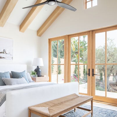 interior of bedroom with light frames andersen e series windows