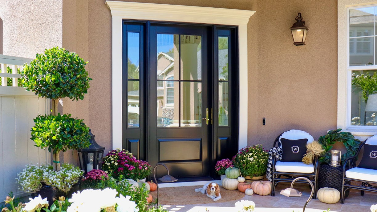 exterior of home with Andersen entry door with black trim