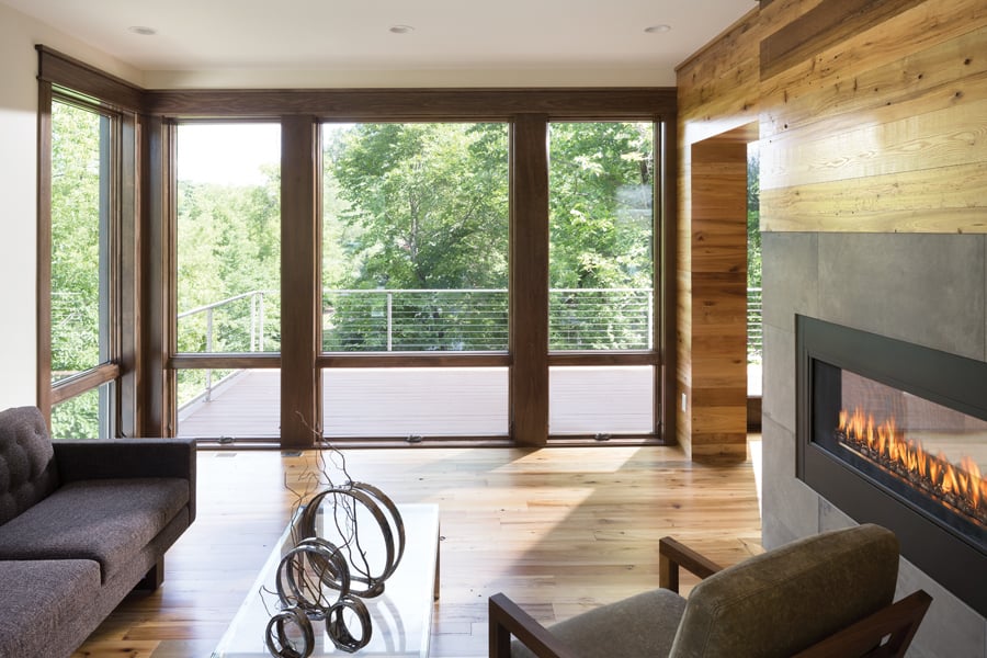 Andersen 400 Series Awning and Picture Windows with Stained Pine Interiors and Traditional Folding Hardware in Stone Finish