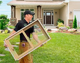 andersen employee carrying window
