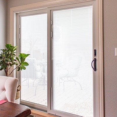 Andersen 200 Series blinds in glass sliding patio door