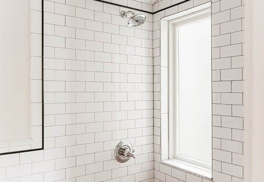 Yellow Brick Home shower window with obscured glass for privacy