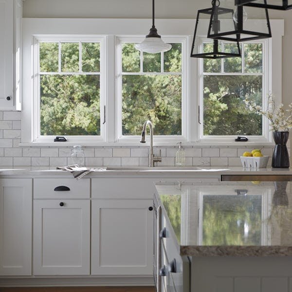 Kitchen with Andersen A-Series Casement Windows with dark brown exteriors