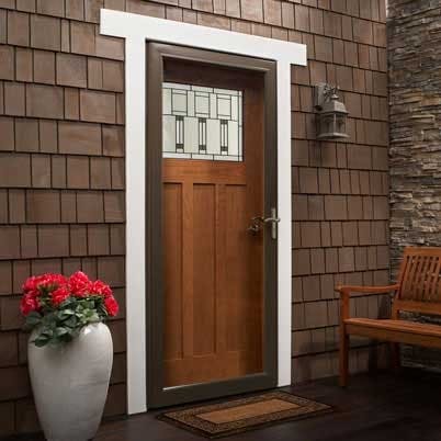 house exterior entry showing andersen wooden door and brown storm door